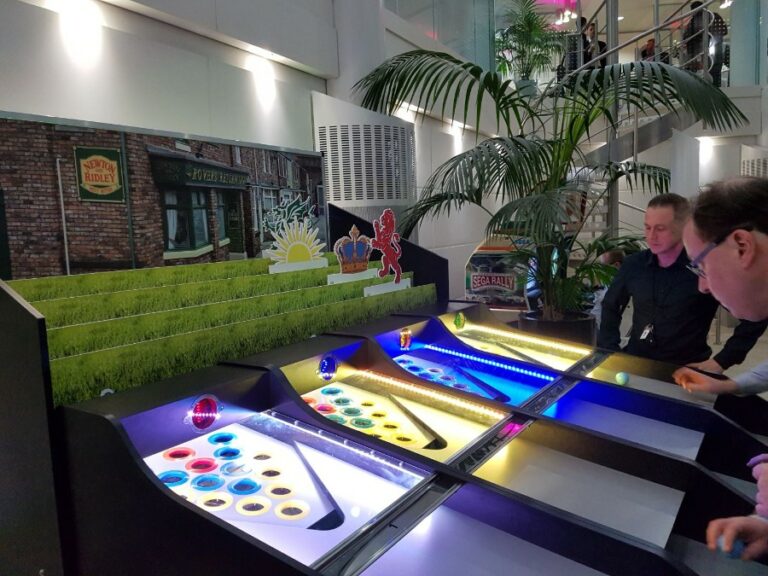 Team building with interactive simulators and pub-style games