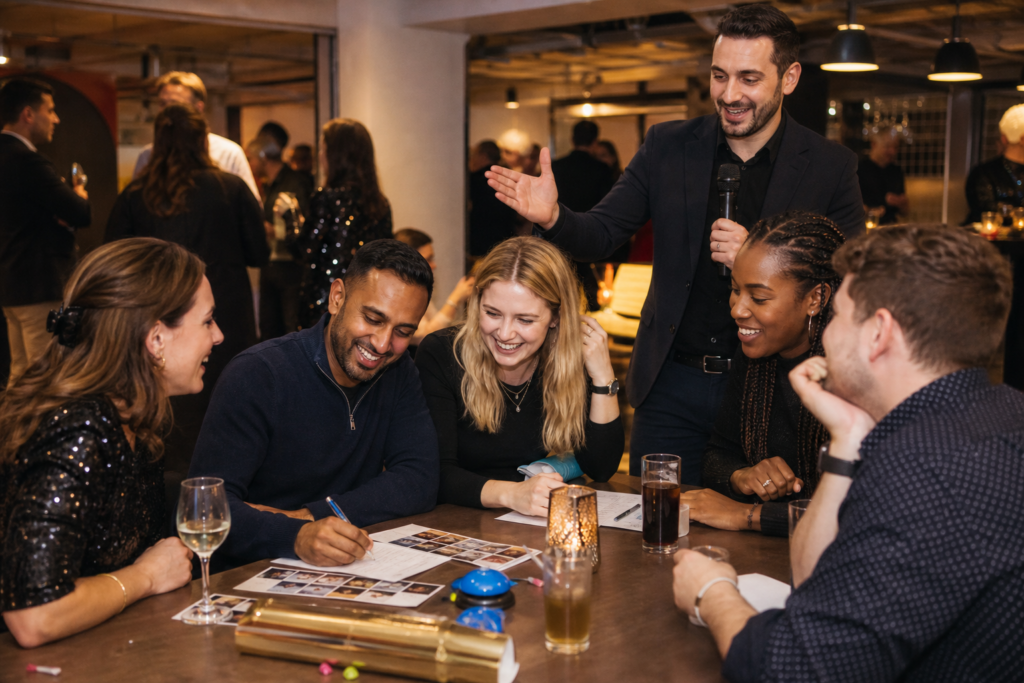 Colleagues enjoying office party games at a corporate event