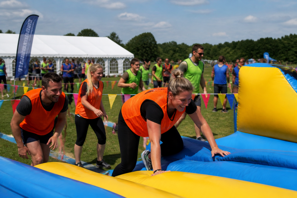 Corporate team building away day with colleagues taking part in an outdoor group activity