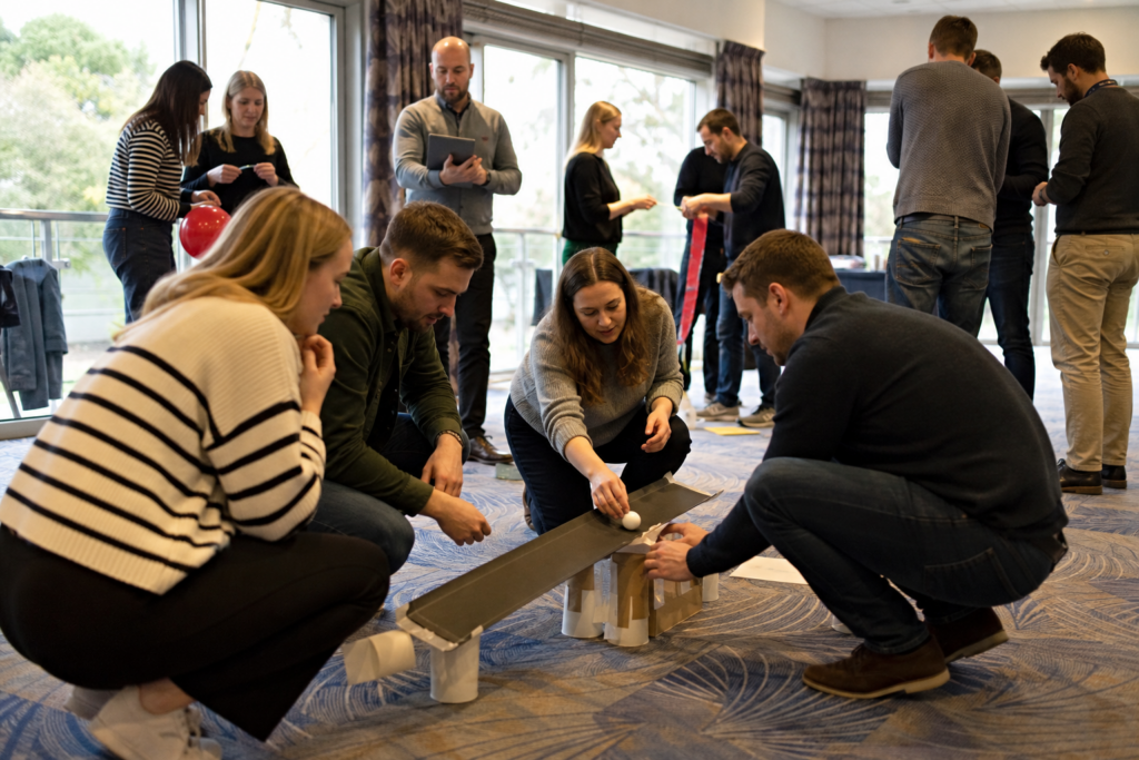 Corporate teams taking part in a facilitated away day challenge