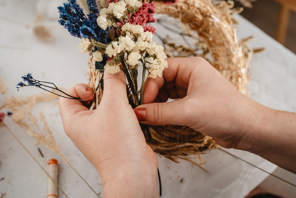 Girl,Making,Floral,Door,Wreath,Using,Colorful,Dry,Summer,Flowers
