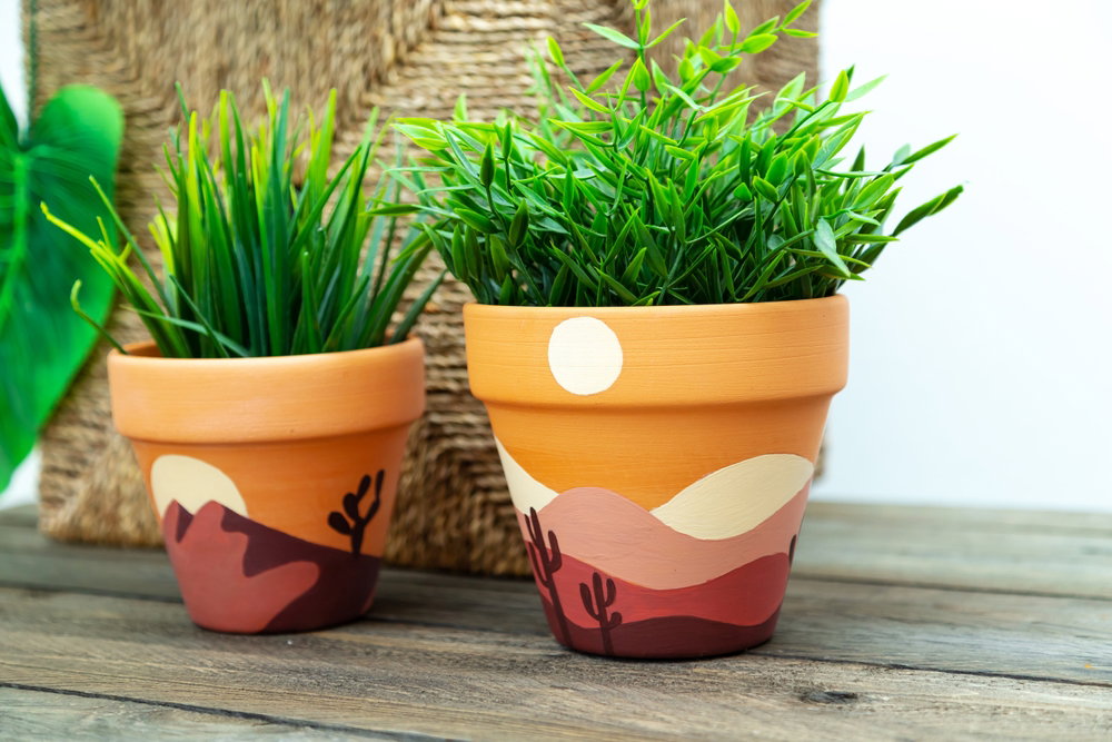 Artificial,Plant,In,A,Clay,Terracotta,Pot ,Hand,Painted,With