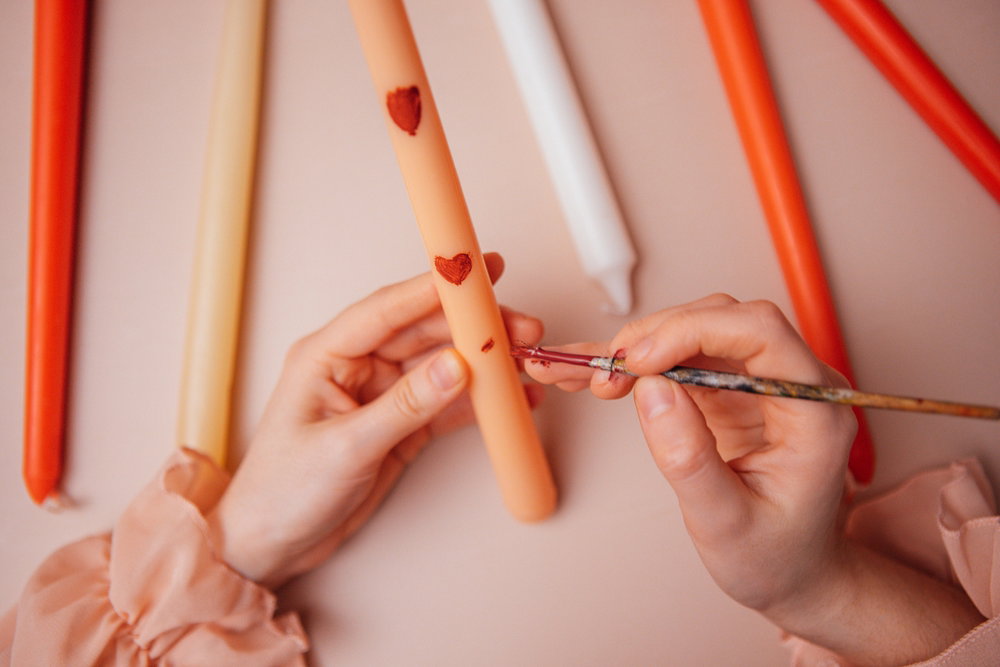 Close up,Of,The,Artist,Hands,Painting,Candles ,A,Female,Hands