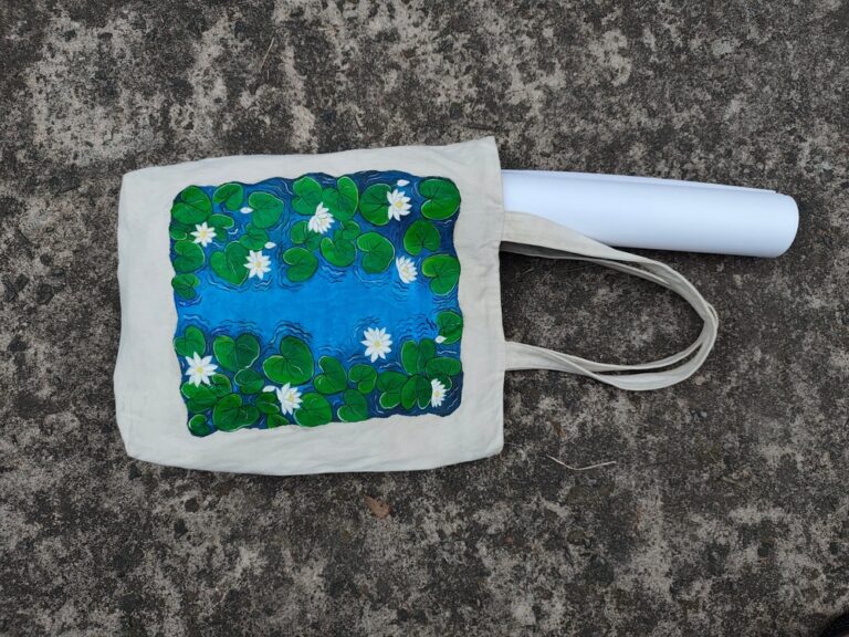The,Image,Shows,A,Reusable,Tote,Bag,With,A,Hand painted
