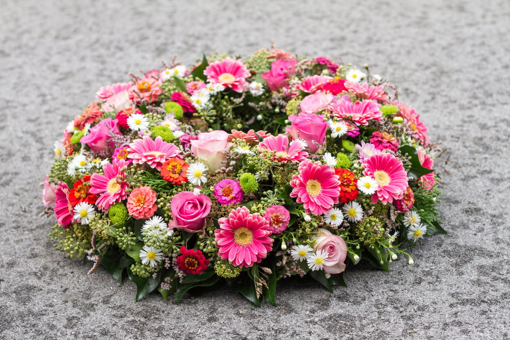 A,Beautiful,Flower,Wreath,With,Colorful,Blooming,Gerberas,,On,Isolated